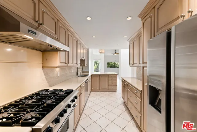 a kitchen with a sink and a window