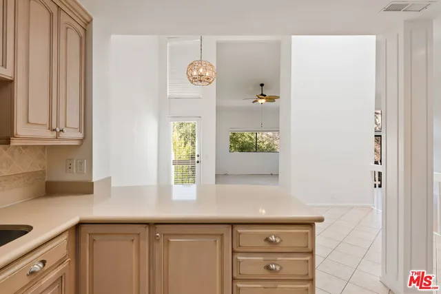 a view of a balcony with furniture