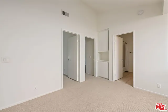 a view of staircase with rug floor