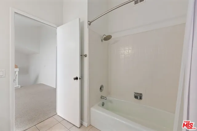 a view of a big room with a window