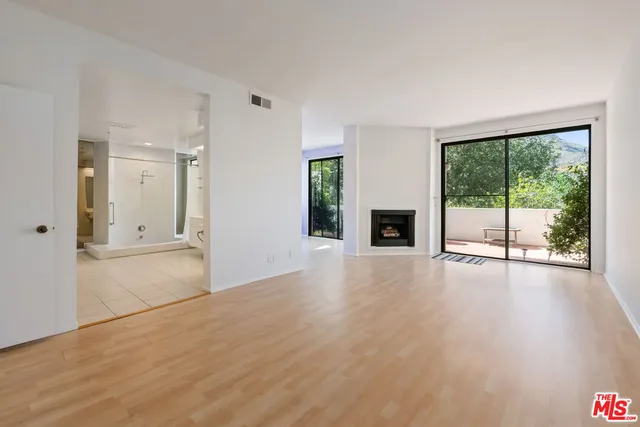 a view of a room with a large window