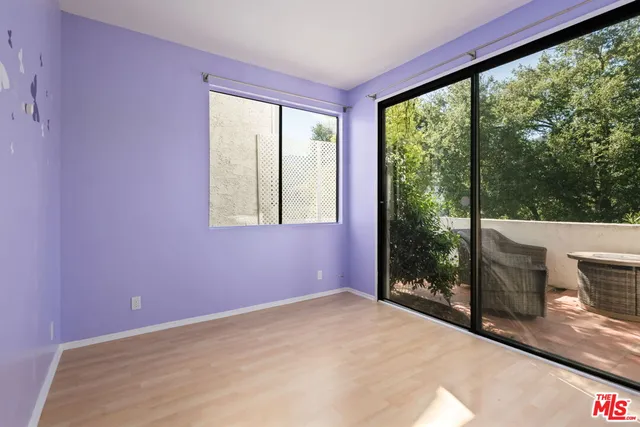 a view of balcony with furniture