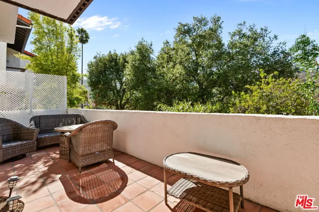 a bathroom with a sink a mirror and a bathtub