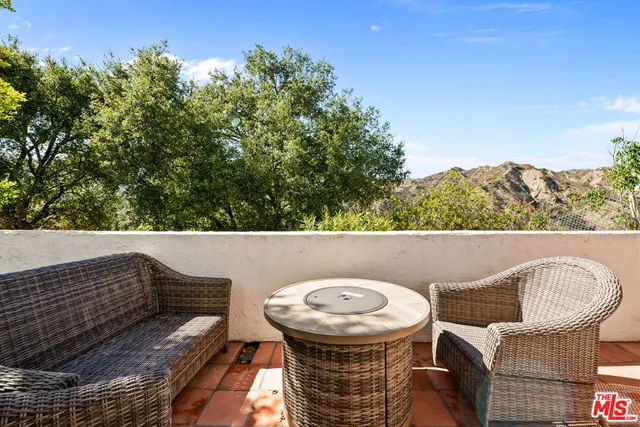 a bathroom with a sink mirror and a bathtub