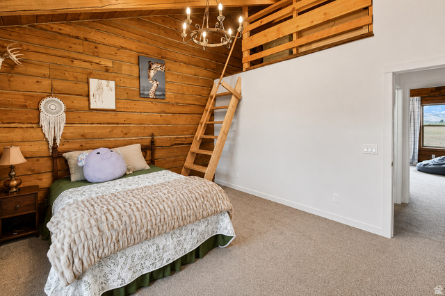 544 East 600 North, Unit 1 Joseph, UT 84739 - Photo 27 of 65 Interior room featuring wood-plank walls and a wood-beamed ceiling