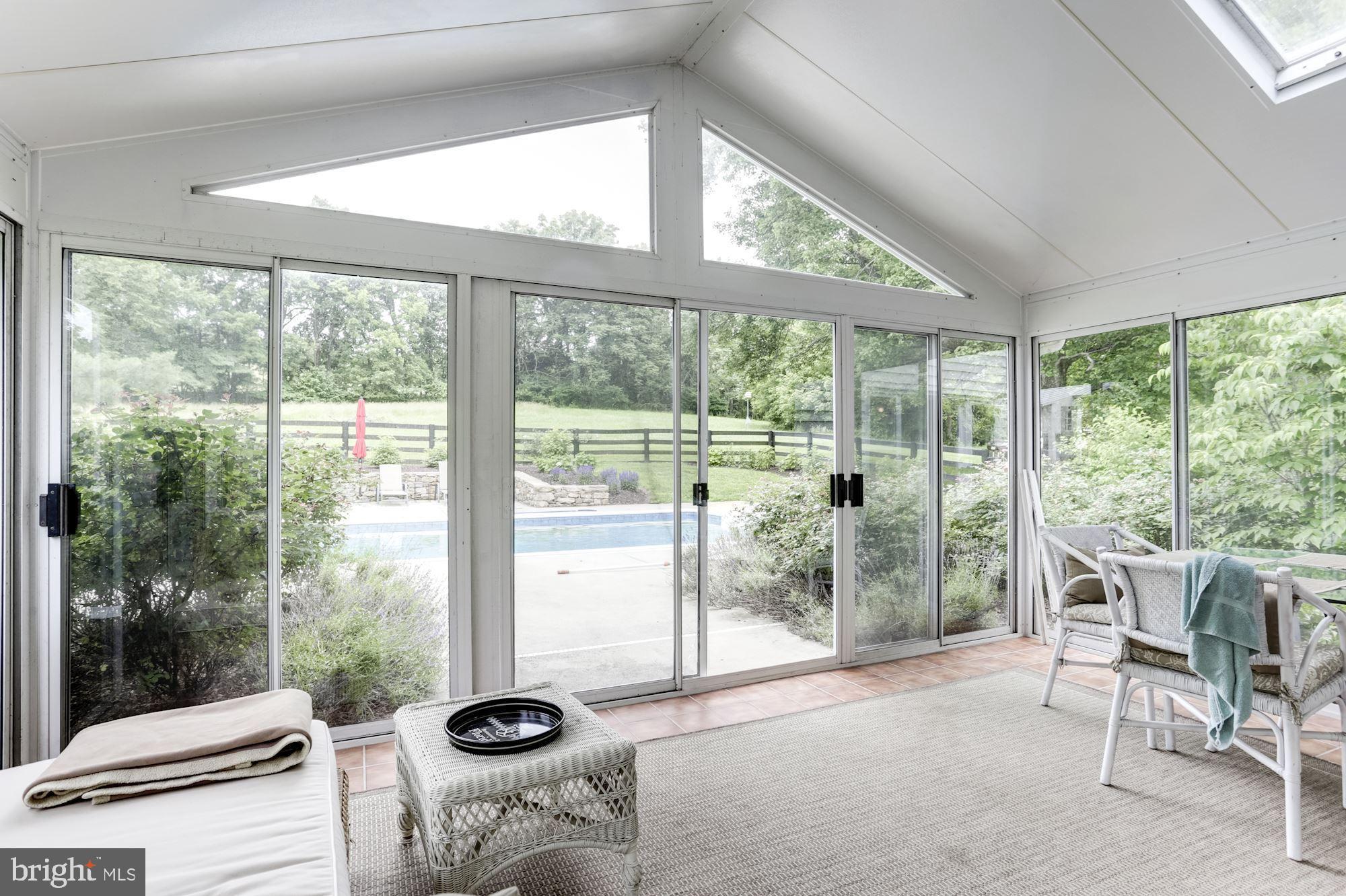 11312 Russell Road Purcellville, VA 20132 - Photo 22 of 74 Sun Room by Pool