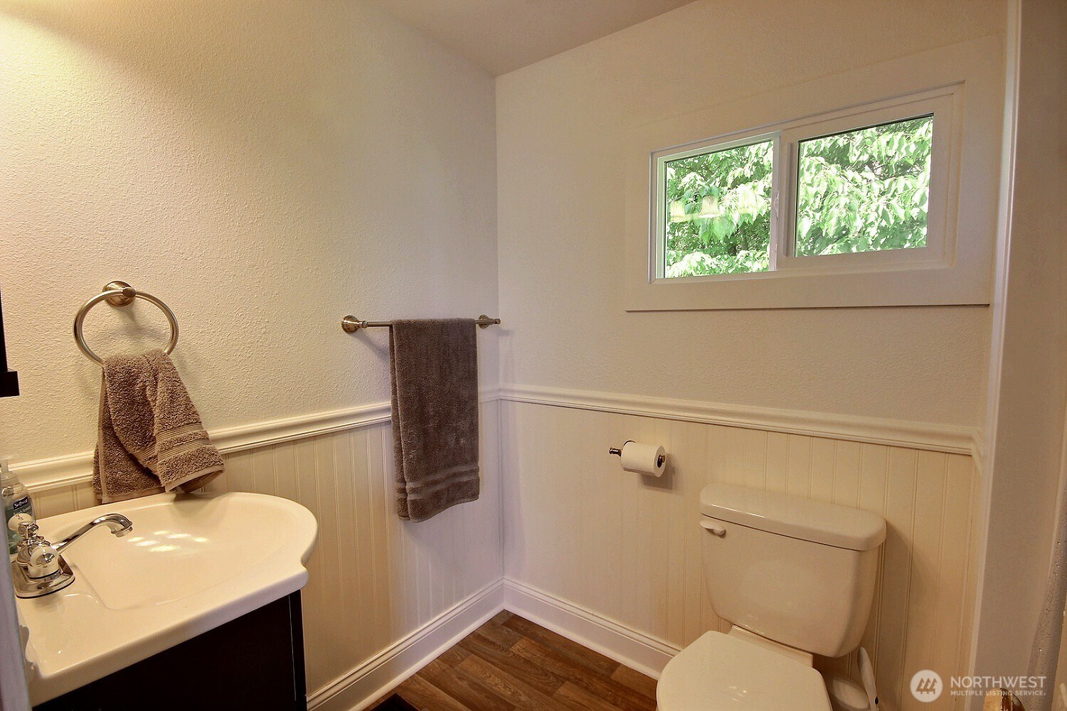 414 Sumner Avenue Sumner, WA 98390 - Photo 9 of 22 a bathroom with a toilet sink and mirror