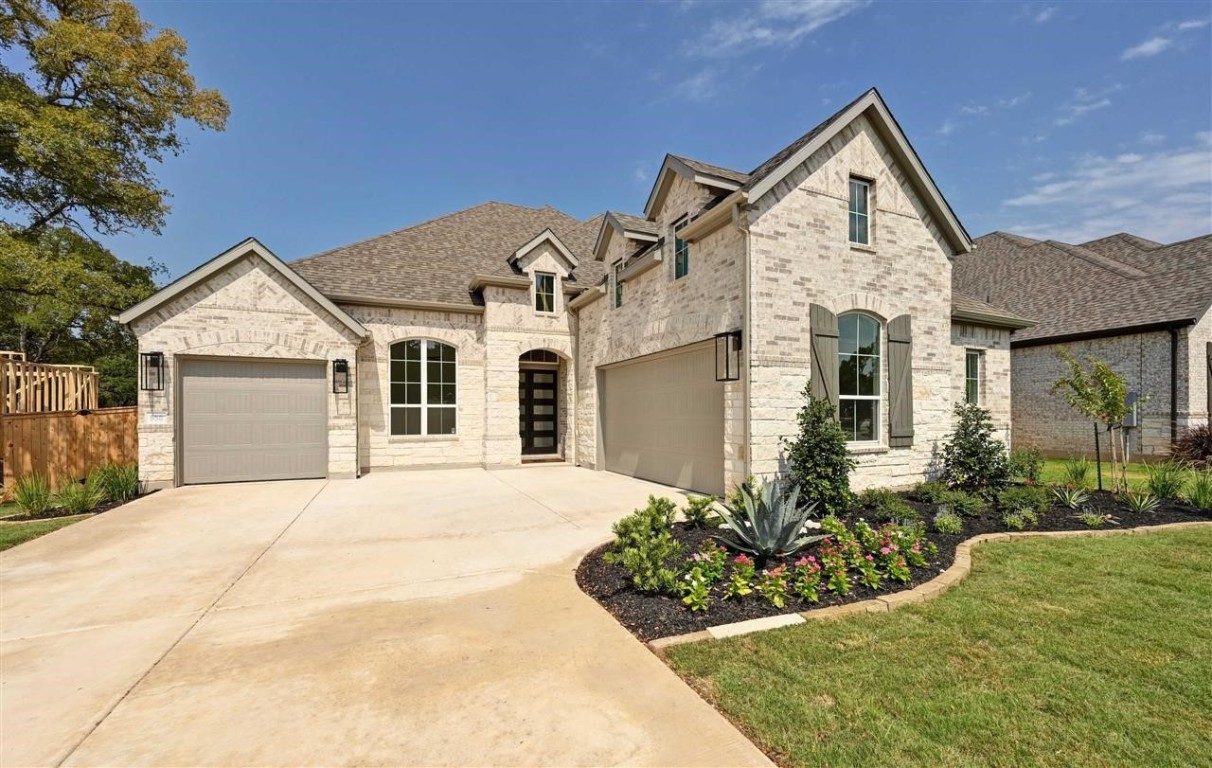 550 Wood Thrush Run Kyle, TX 78640 - Photo 1 of 1 front view of a house with a yard
