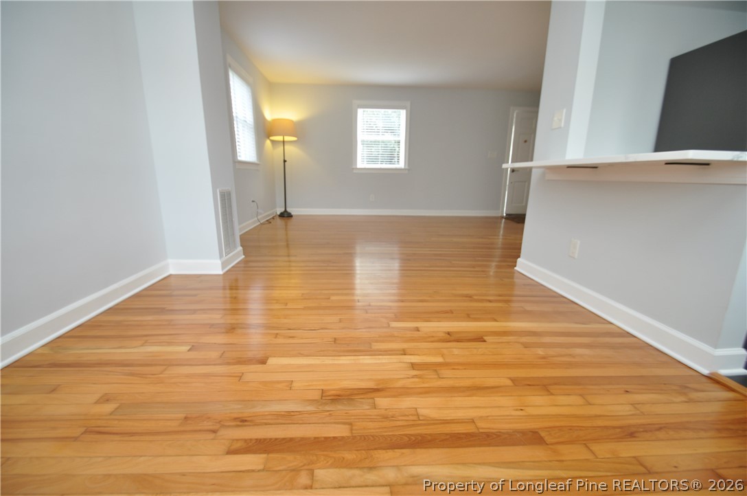 1008 Nichols Drive Raleigh, NC 27605 - Photo 11 of 33 a view of a big room with wooden floor
