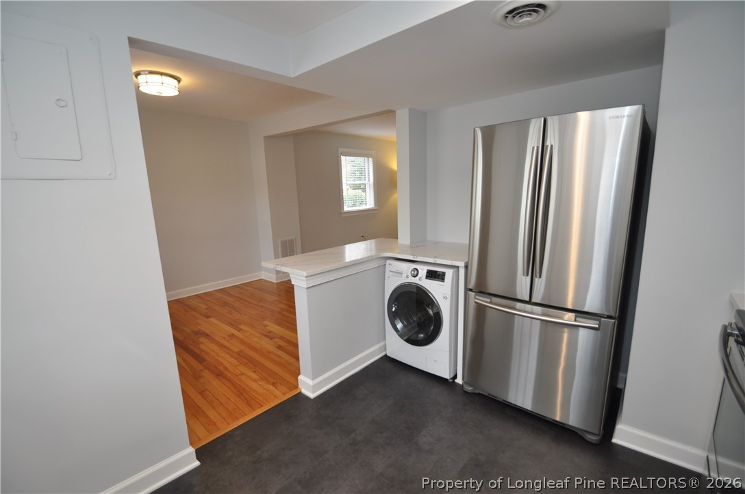 1008 Nichols Drive Raleigh, NC 27605 - Photo 17 of 33 a utility room with dryer and washer