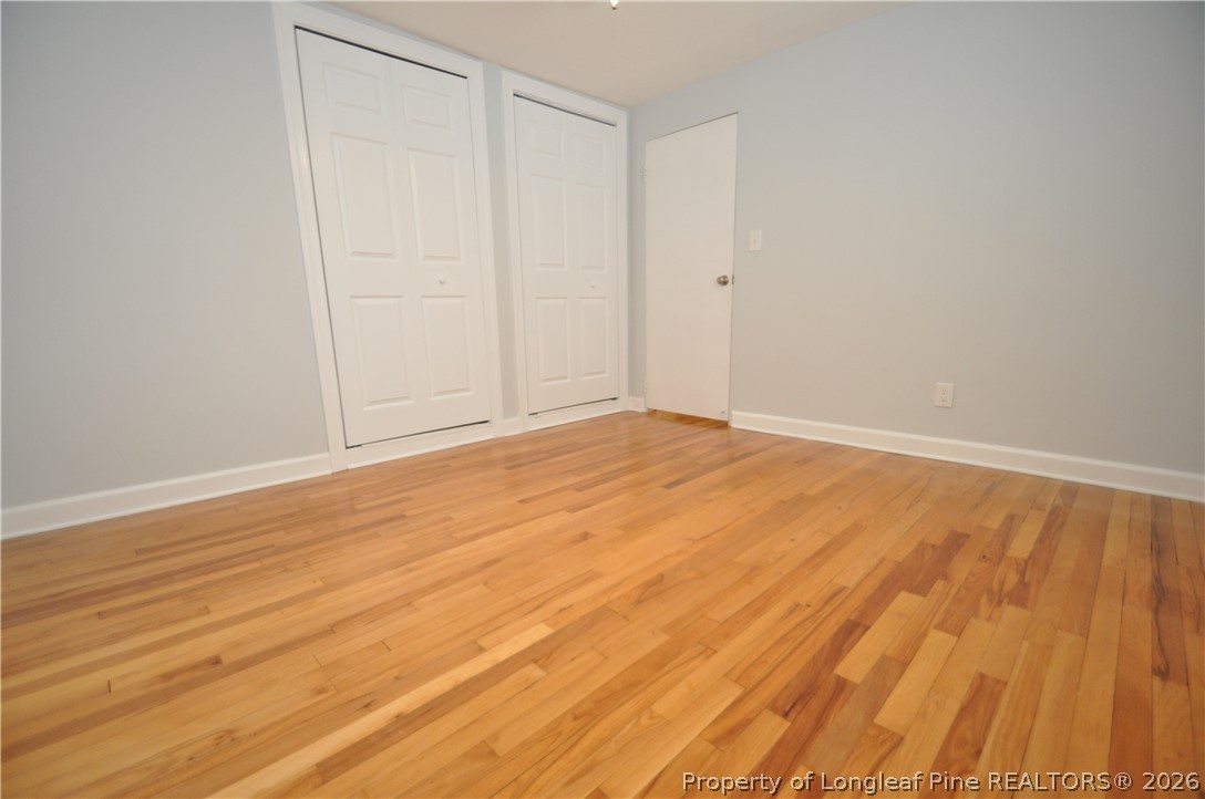 1008 Nichols Drive Raleigh, NC 27605 - Photo 28 of 33 a view of an empty room with wooden floor