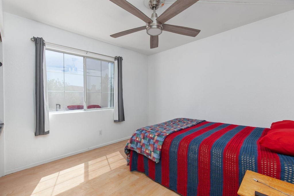 305 Cobblestone Place Santee, CA 92071 - Photo 19 of 36 a bedroom with a bed and a window