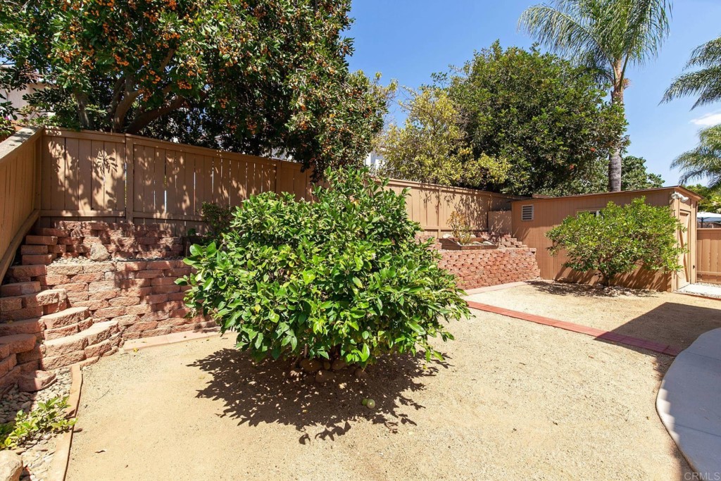 305 Cobblestone Place Santee, CA 92071 - Photo 25 of 36 a view of a garden with pathway