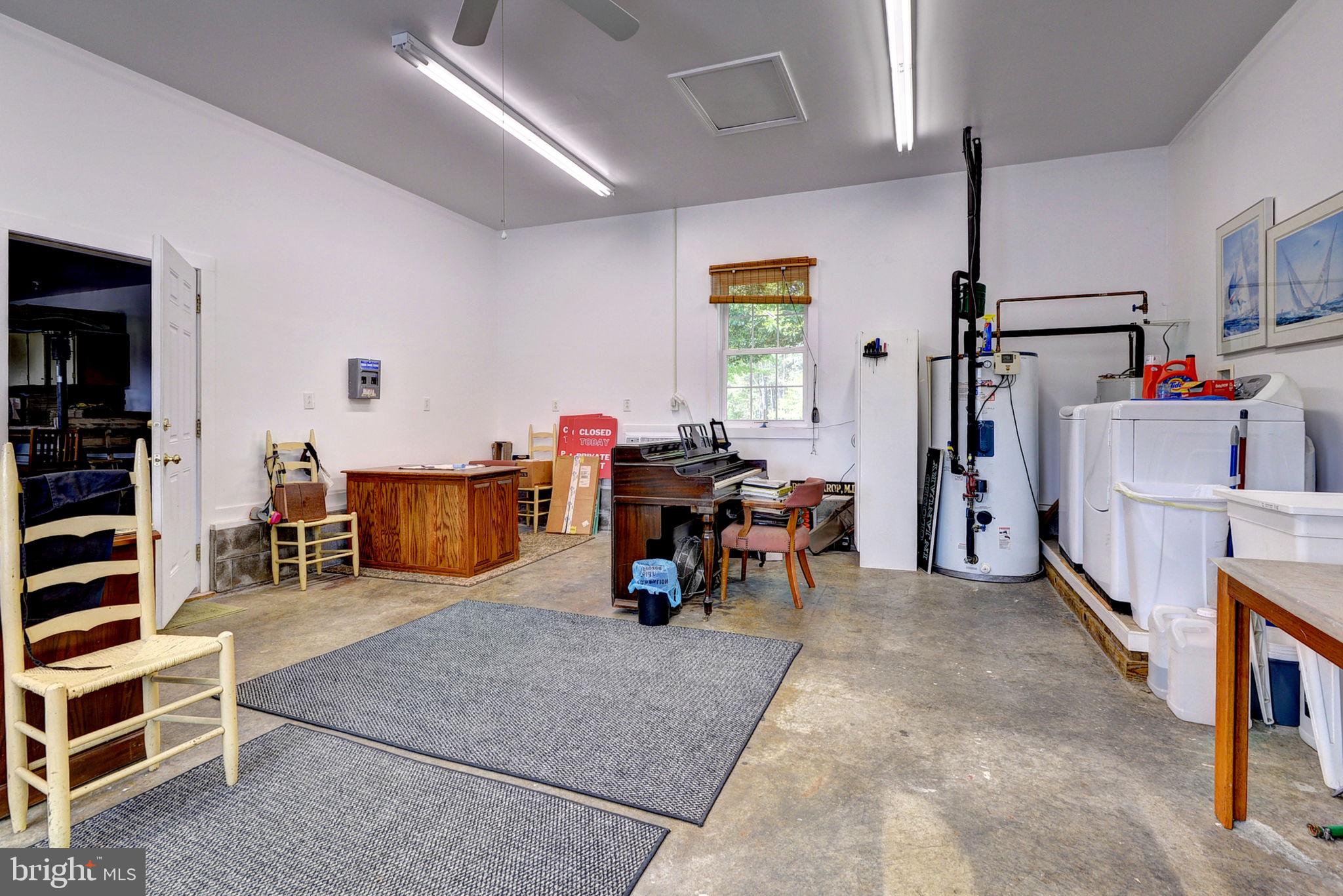 1025 Goodluck Road Lancaster, VA 22503 - Photo 127 of 132 a view of a livingroom with furniture and furniture