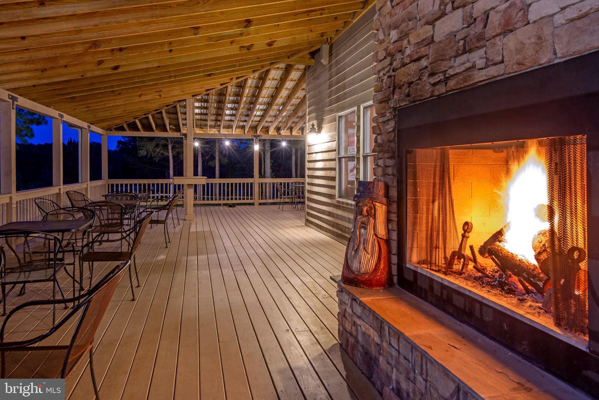 1025 Goodluck Road Lancaster, VA 22503 - Photo 14 of 132 a outdoor space with wooden floor and city view