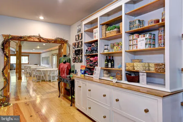 a view of a livingroom with furniture and furniture