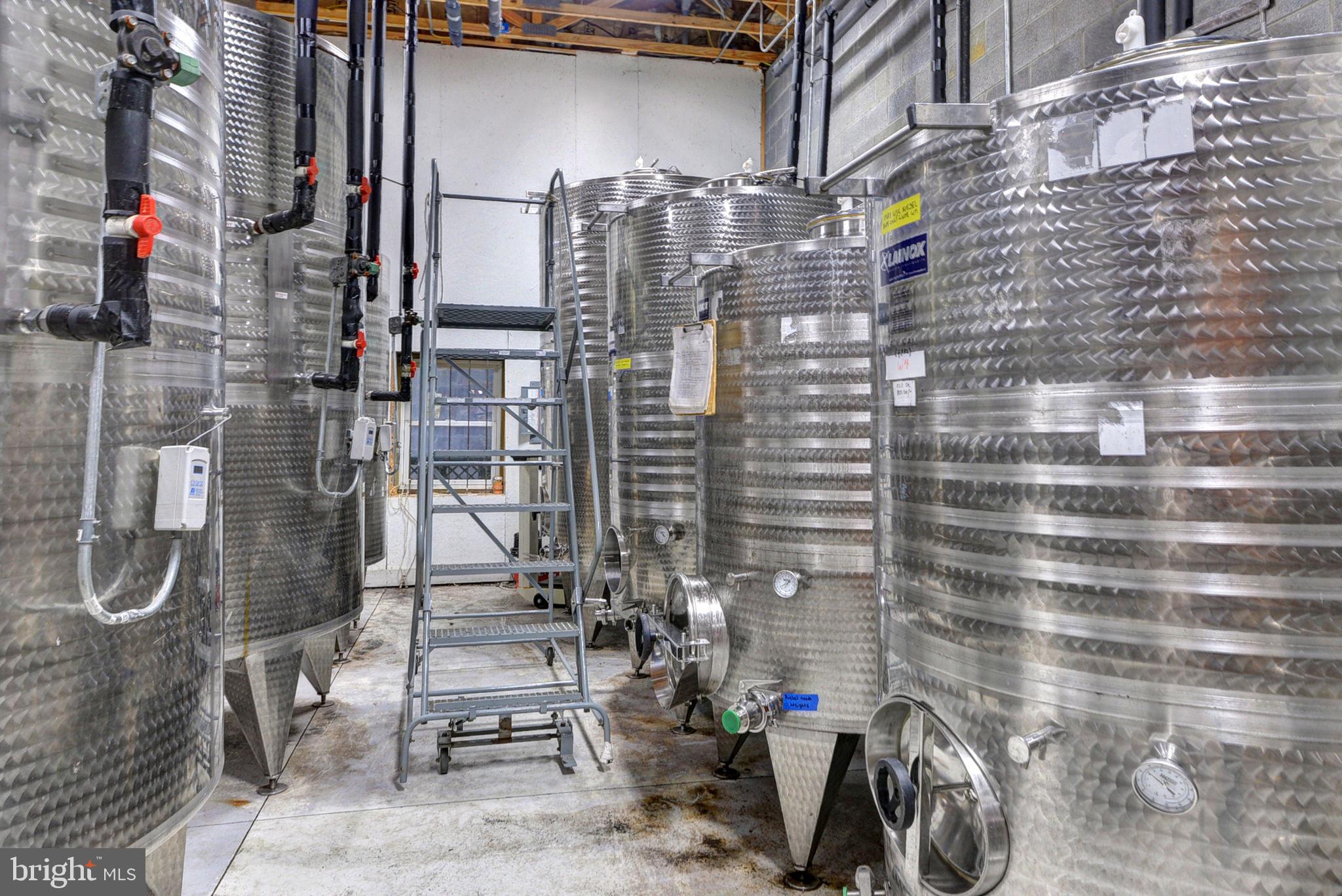 1025 Goodluck Road Lancaster, VA 22503 - Photo 79 of 132 a view of a building with sitting area