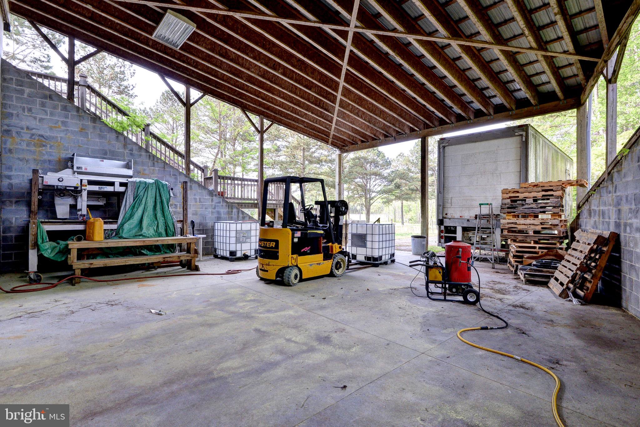 1025 Goodluck Road Lancaster, VA 22503 - Photo 80 of 132 a view of outdoor space with porch and sitting area