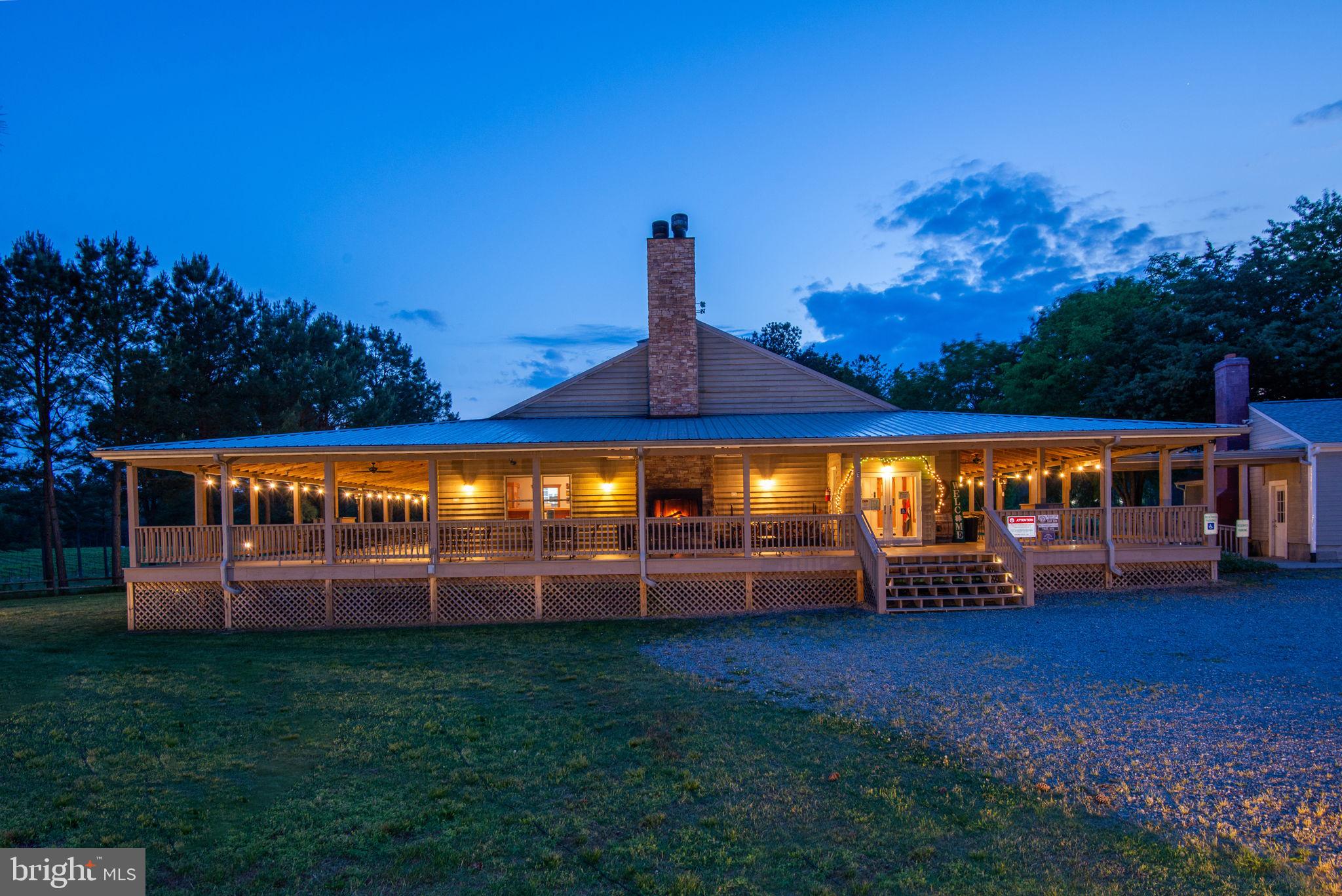 1025 Goodluck Road Lancaster, VA 22503 - Photo 10 of 132 a view of a house with a yard