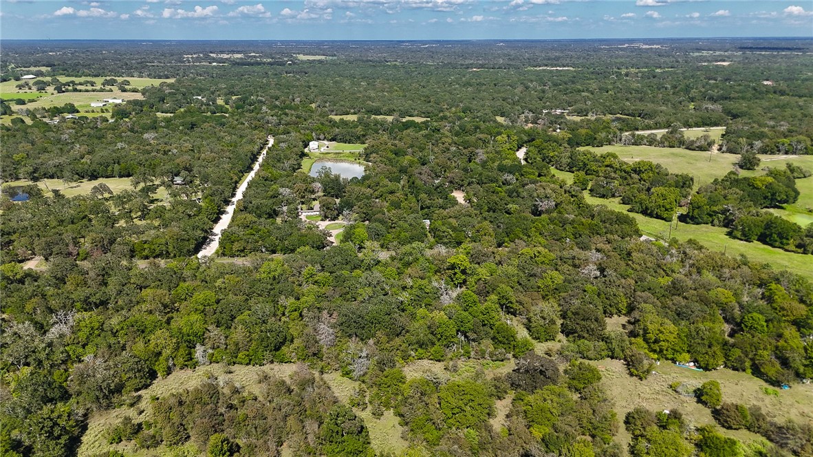 Tbd Lot 2 Tbd Road Bryan, TX 77808 - Photo 4 of 10 an aerial view of residential houses with outdoor space and trees