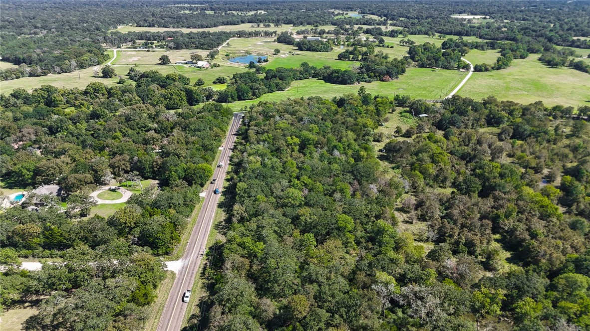 Tbd Lot 2 Tbd Road Bryan, TX 77808 - Photo 5 of 10 an aerial view of residential houses with outdoor space and trees