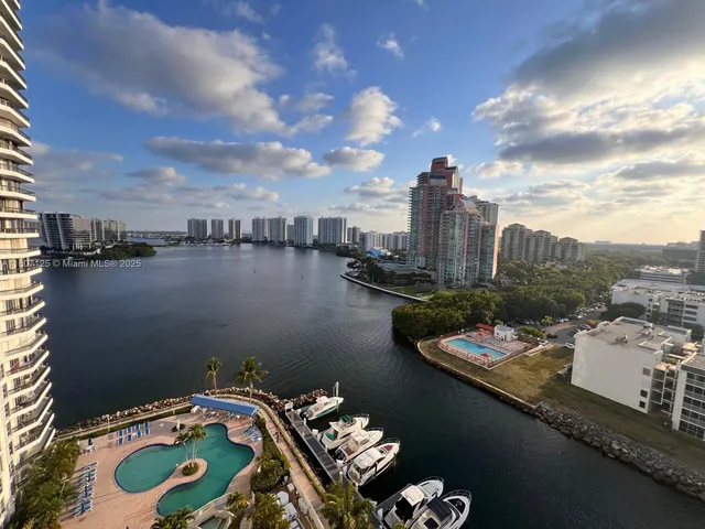 a view of a lake from a balcony