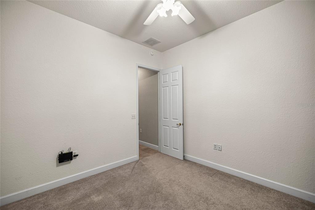 9512 Southeast 124th Loop Summerfield, FL 34491 - Photo 23 of 76 an empty room with a empty space