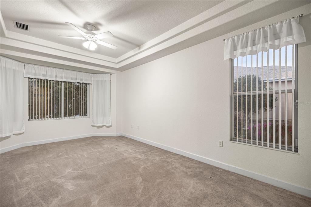 9512 Southeast 124th Loop Summerfield, FL 34491 - Photo 24 of 76 a view of an empty room with a window