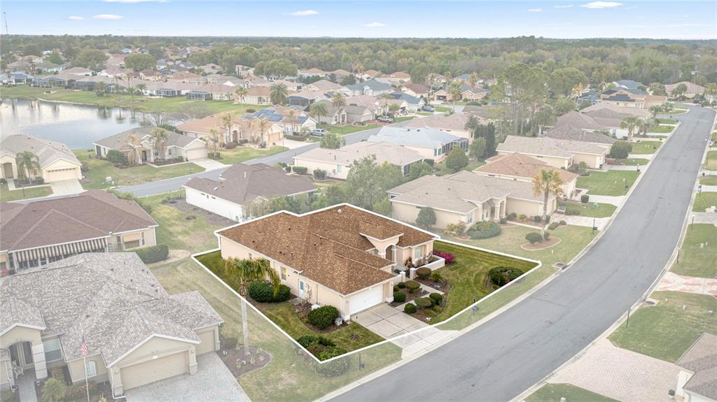 9512 Southeast 124th Loop Summerfield, FL 34491 - Photo 35 of 76 an aerial view of residential houses with outdoor space