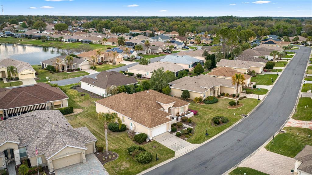 9512 Southeast 124th Loop Summerfield, FL 34491 - Photo 36 of 76 an aerial view of residential houses with outdoor space