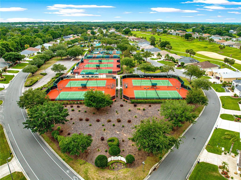 9512 Southeast 124th Loop Summerfield, FL 34491 - Photo 72 of 76 an aerial view of residential houses with outdoor space and street view