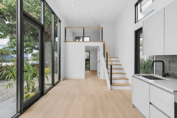 a view of entryway with washer and dryer