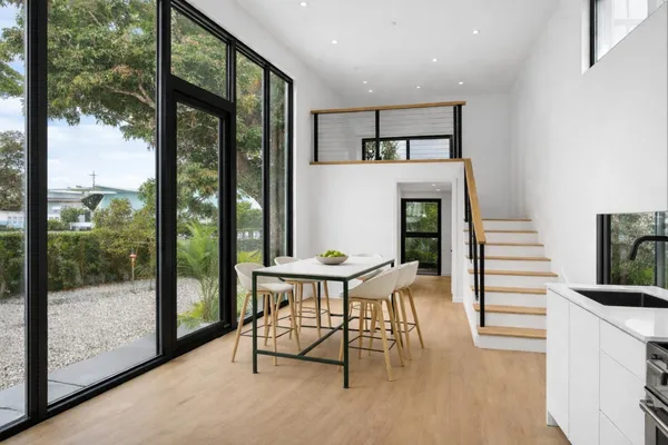 a view of a hallway with staircase