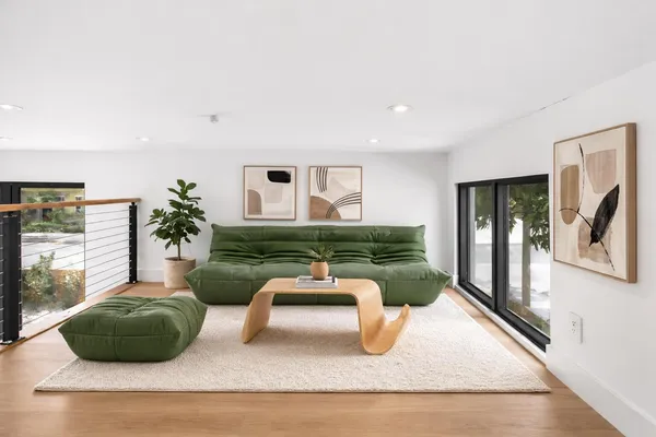 a couple of potted plants in front of door