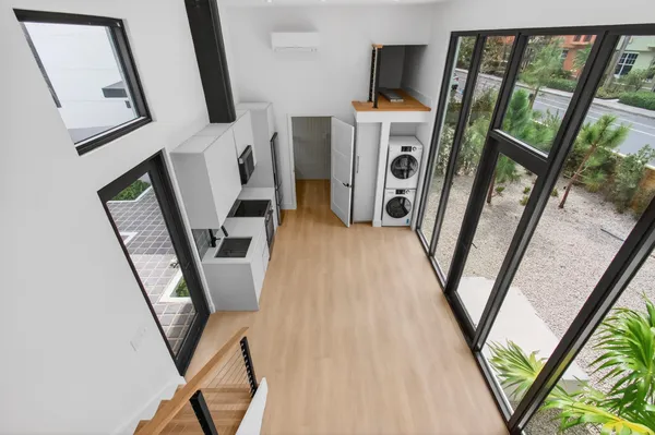 a view of a pathway with a garden