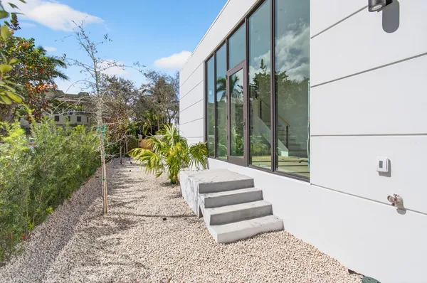 a picture of a bathroom with a shower and a window