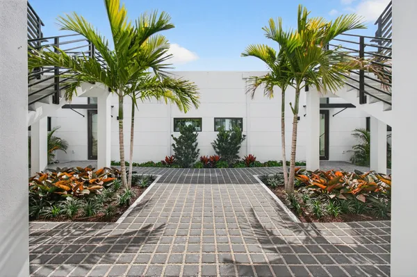 a front view of a house with a patio