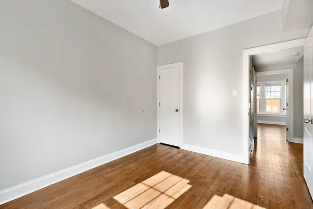 wooden floor in a hall with an entryway