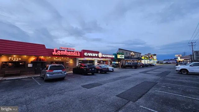 a view of a building with sitting area