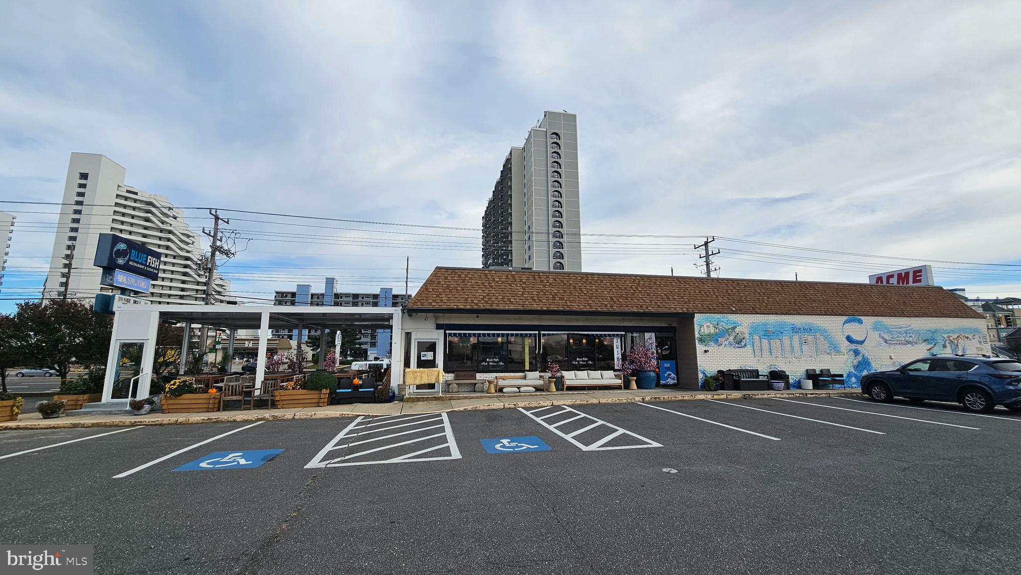 745 Mooring Road, Unit 111 Ocean City, MD 21842 - Photo 17 of 24 a car parked in front of a building