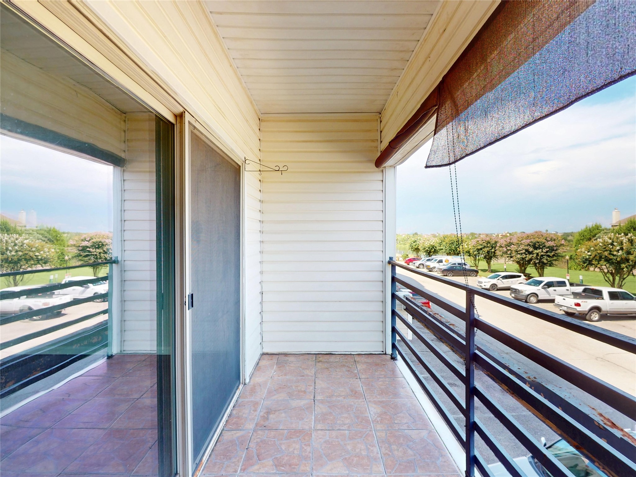 793 Davis Road, Unit 111 League City, TX 77573 - Photo 5 of 16 Enjoy your morning coffee or evening relaxation time on the tiled balcony. Adjustable sunshade is a nice added feature.
