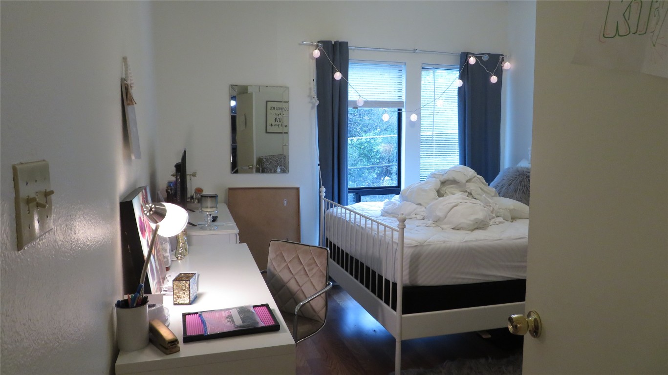 1910 Robbins Place, Unit 202 Austin, TX 78705 - Photo 13 of 15 a living room with furniture