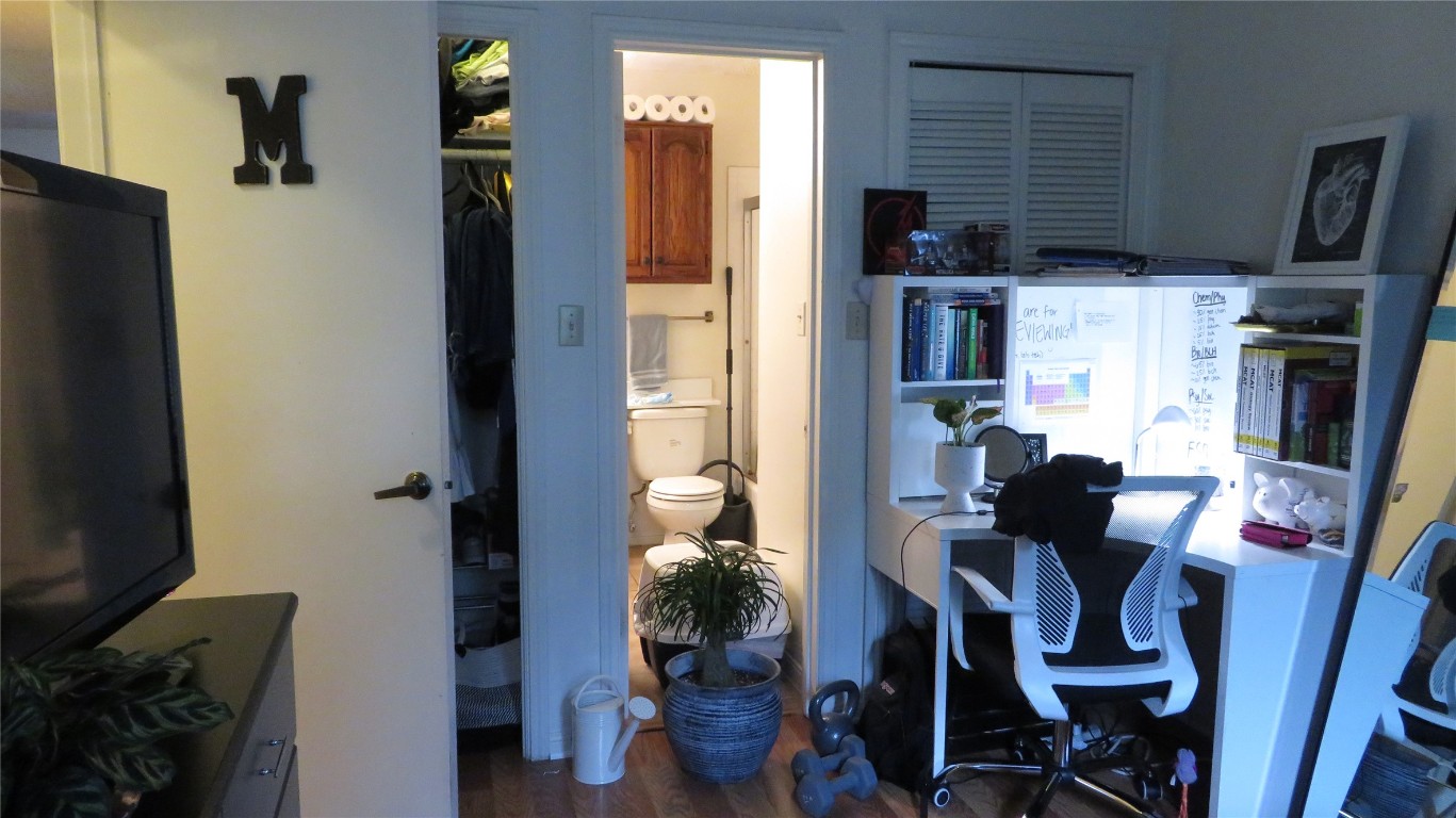 1910 Robbins Place, Unit 202 Austin, TX 78705 - Photo 10 of 15 a view of a dining room with furniture
