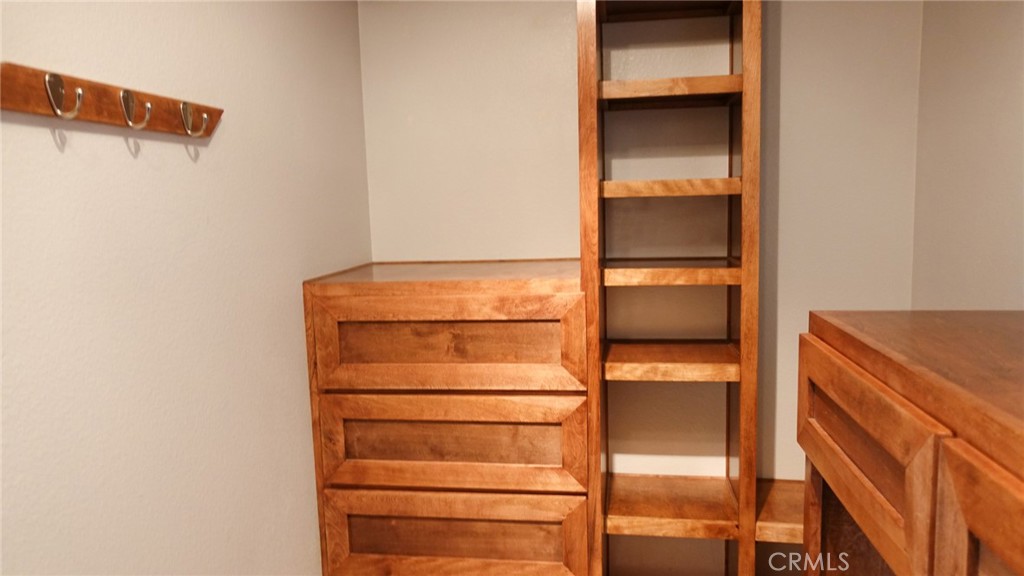 33953 Lily Road Yucaipa, CA 92399 - Photo 19 of 38 a view of an empty walk in closet