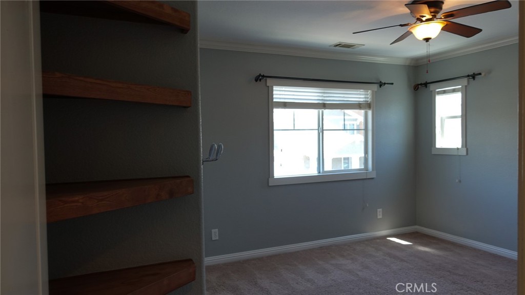 33953 Lily Road Yucaipa, CA 92399 - Photo 24 of 38 a view of an empty room with a window