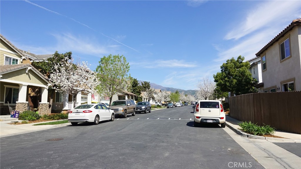 33953 Lily Road Yucaipa, CA 92399 - Photo 30 of 38 a view of a cars parked in front of a house