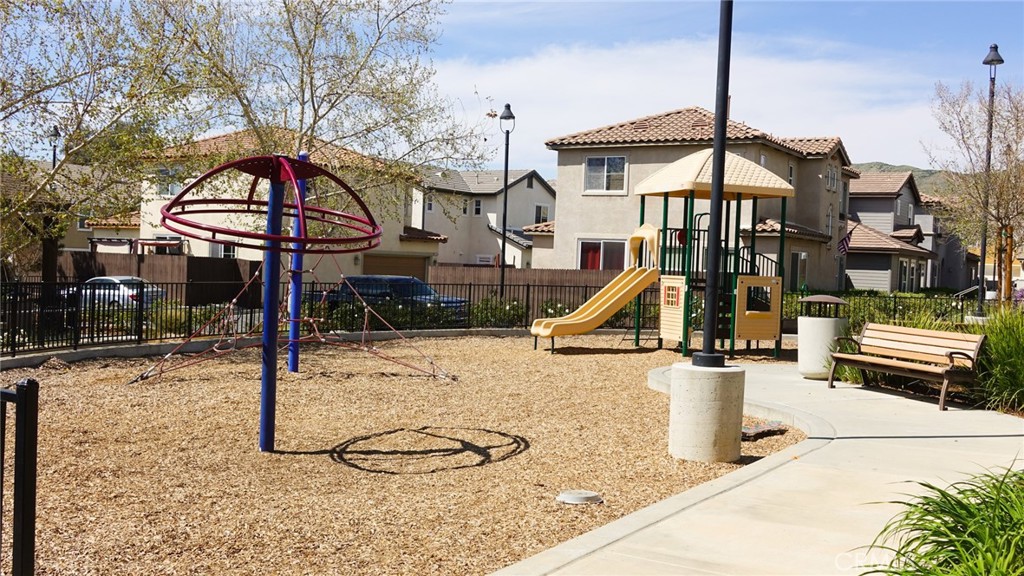 33953 Lily Road Yucaipa, CA 92399 - Photo 32 of 38 a view of a house with basketball court