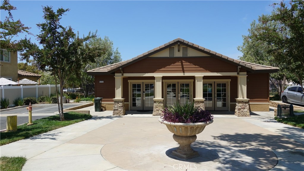 33953 Lily Road Yucaipa, CA 92399 - Photo 33 of 38 a view of a house with sitting area and garden