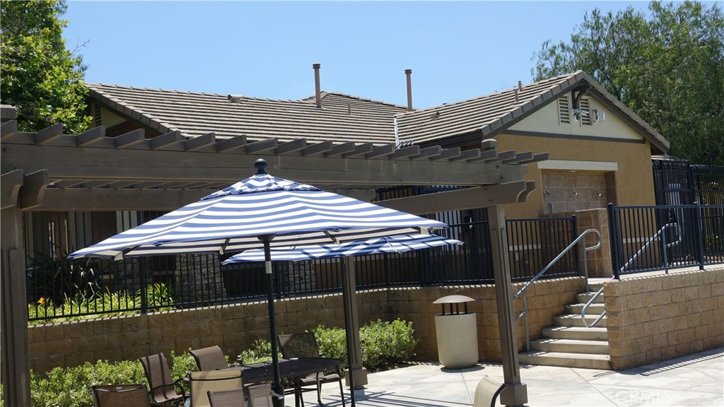 33953 Lily Road Yucaipa, CA 92399 - Photo 34 of 38 a front view of a house with a glass door