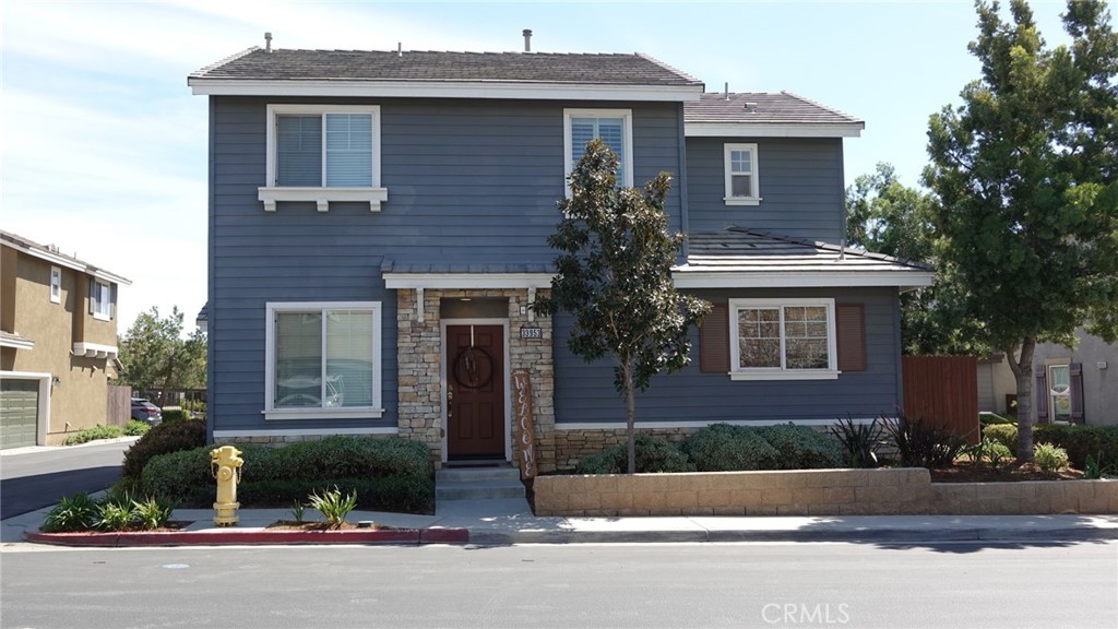 33953 Lily Road Yucaipa, CA 92399 - Photo 38 of 38 a front view of a house with a garden